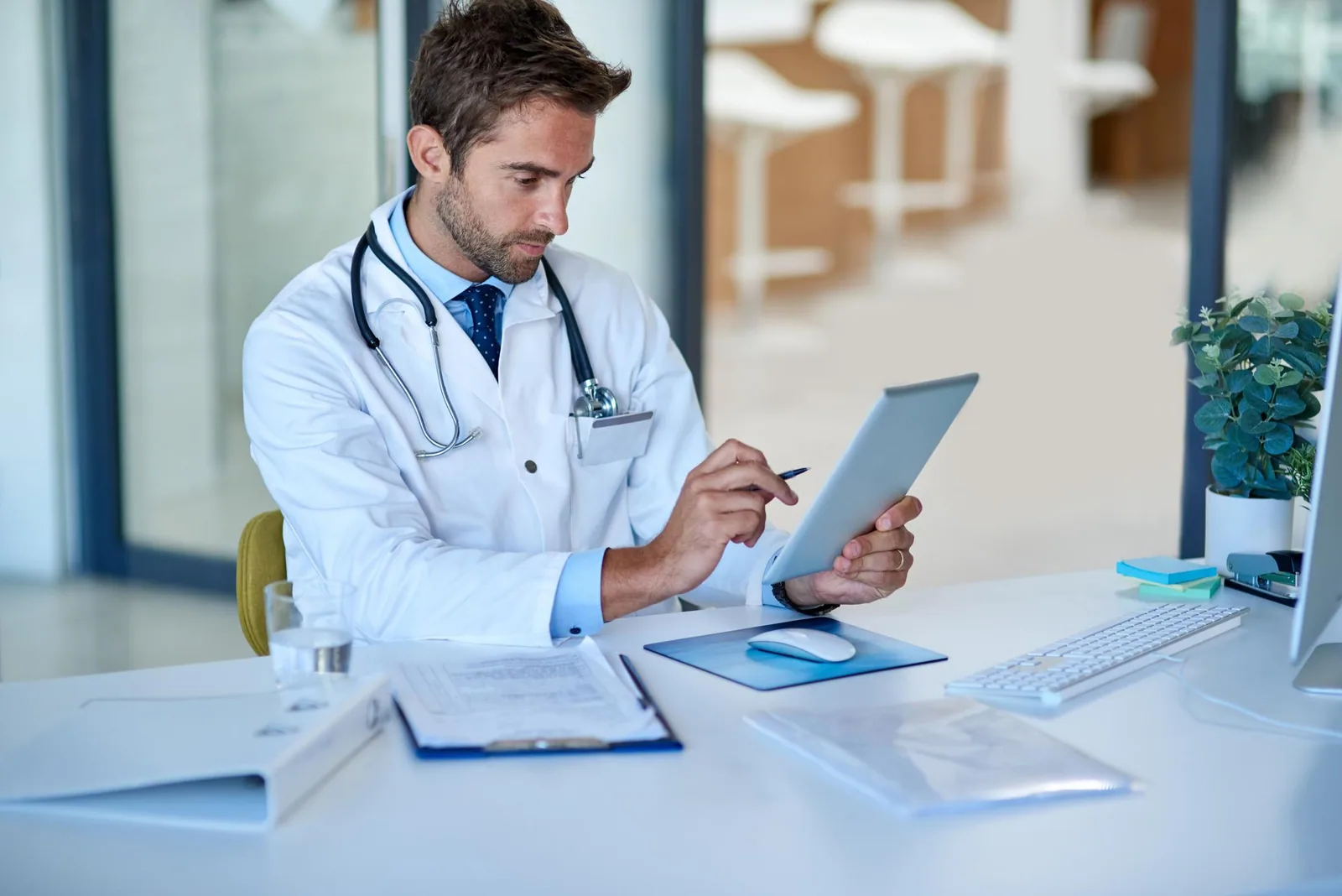 Healthcare professional reviewing medical information